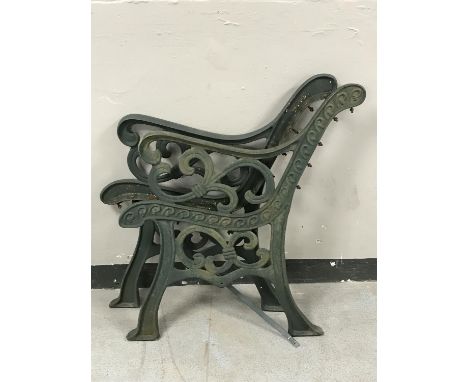 A pair of cast iron bench ends