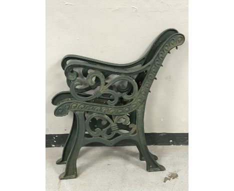 A pair of cast iron bench ends 