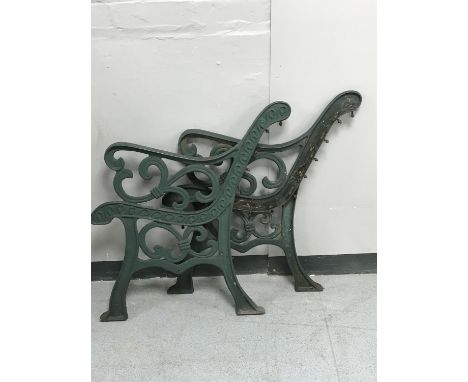 A pair of cast iron bench ends