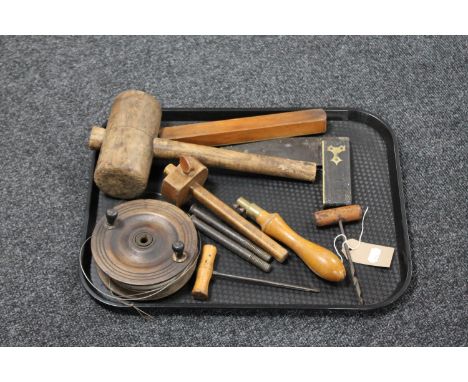 A tray containing antique fishing reel, vintage woodworking tools and an antique corkscrew