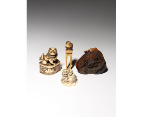 λ THREE JAPANESE IVORY NETSUKE EDO PERIOD AND LATER, 18TH CENTURY AND LATER One carved as a small bird perched on a tall four