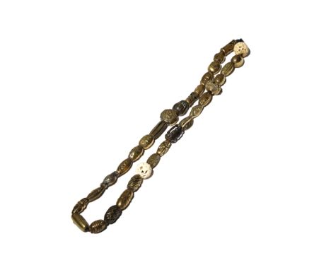 A COLLECTION OF THIRTY-TWO JAPANESE BEADS, OJIME MEIJI PERIOD AND LATER, 19TH AND 20TH CENTURY Thirty made of metal and the t
