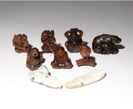 A COLLECTION OF EIGHT JAPANESE NETSUKE EDO PERIOD AND LATER, 18TH CENTURY AND LATER Seven made of wood, variously carved as D