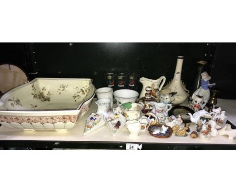 A large quantity of china including crested china, NAO, Wade etc