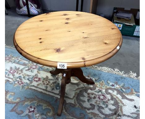 A pine tripod table
