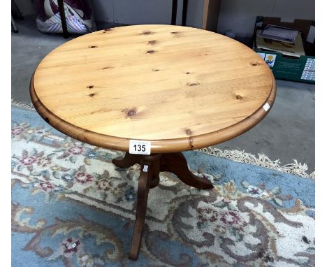 A pine tripod table