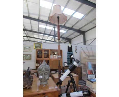 An unusual standard lamp with shade