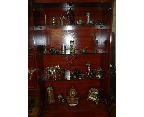 A collection of novelty lighters including deep sea diver's helmet, motor cars, knights, animals etc