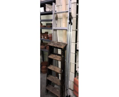 A metal ladder & wooden step ladder