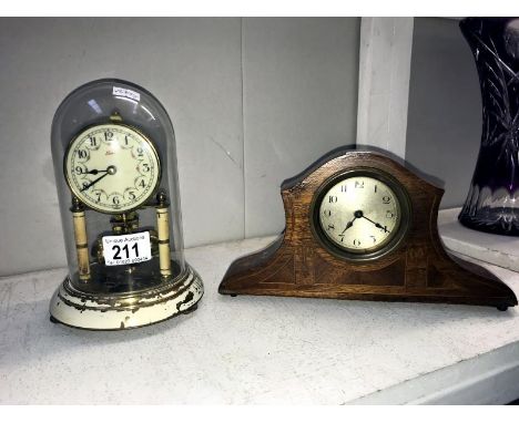 An inlaid mahogany mantle clock & an anniversary clock under glass dome