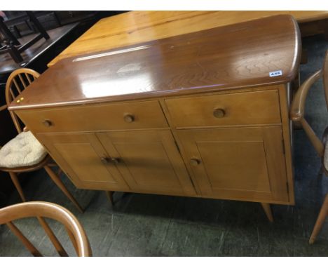 An Ercol Golden Dawn sideboard