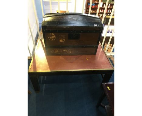 Coffee table and a dome top trunk