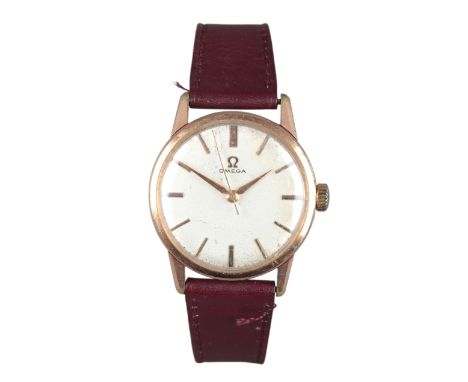 OMEGA: A GOLD-PLATED WRISTWATCHwith manual wind movement, the silver dial with gold baton hour markers and gold hands, with s