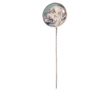 AN ANTIQUE FRENCH ENAMELLED STICK PINin 9ct gold, painted to depict a dog, engraved to the edge: 'L'amitie', 'Lancelot' & 'Fi