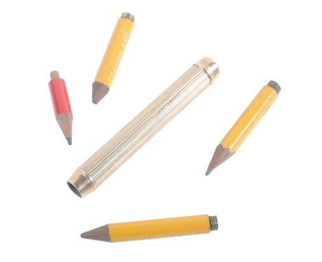 A 9CT GOLD PENCIL BY MORDAN & COthe reeded barrel with cartouche dated 19th September 1913, 8cm long, c. 27g gross, together 