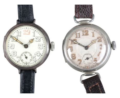 A SILVER CASE TRENCH WATCHwith manual wind movement, the white dial with black Arabic numerals, subsidiary seconds dial and l
