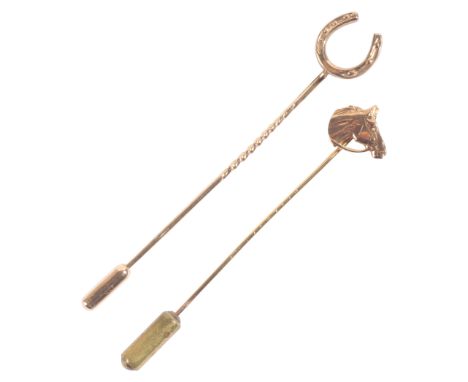 A HORSESHOE PINin 9ct gold; together with a horse motif stick pin in 9ct gold, full British hallmarks, (c.3.6g gross weight)