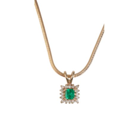 AN EMERALD AND DIAMOND PENDANT NECKLACEin 14ct gold, set with a step cut emerald, surrounded by a border of round brilliant c