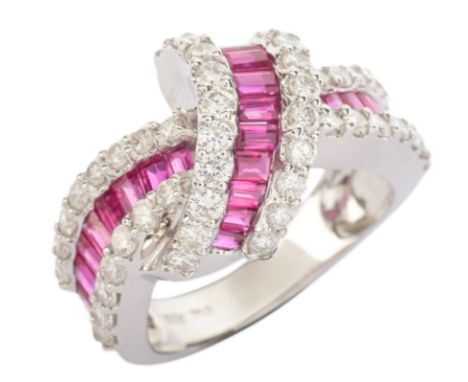 A VINTAGE RUBY AND DIAMOND DRESS RING in 18ct white gold, in a ribbon design, set with step cut rubies and round brilliant cu