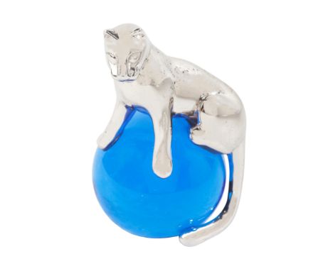 A CARTIER PANTHÈRE PAPER WEIGHT in sterling silver, designed as a panther seated on a blue glass ball, signed 'Cartier', stam