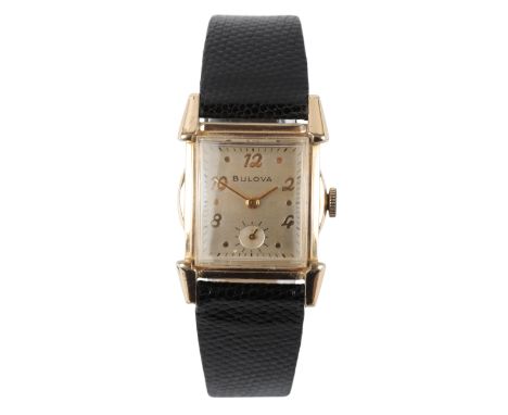 BULOVA: A GOLD-PLATED AND STAINLESS STEEL WRISTWATCHwith manual wind movement, the silver dial with subsidiary seconds dial, 