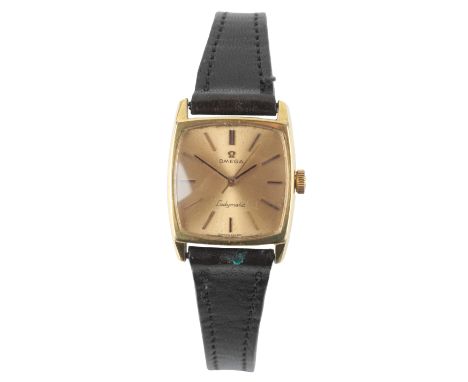 OMEGA LADYMATIC: A GOLD-PLATED WRISTWATCHwith manual wind movement, the gold dial with gold and black baton hour markers and 