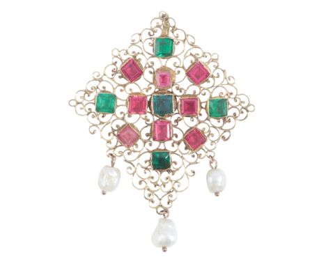 AN ANTIQUE PASTE AND NATURAL PEARL PENDANTin high carat gold, set with step cut red and green paste stones, over an openwork 