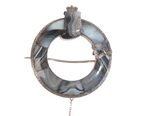 AN ANTIQUE SCOTTISH AGATE BUCKLE BROOCHin sterling silver, inlaid with carved agate, engraved detailing to the silver, secure