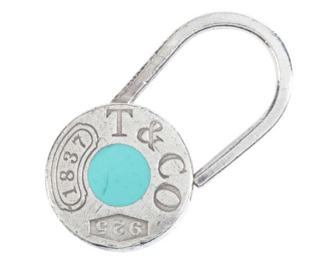 TIFFANY & CO.: A PADLOCK PENDANTin sterling silver, with Tiffany blue enamel, engraved 'T&CO. 1837', full British hallmarks, 