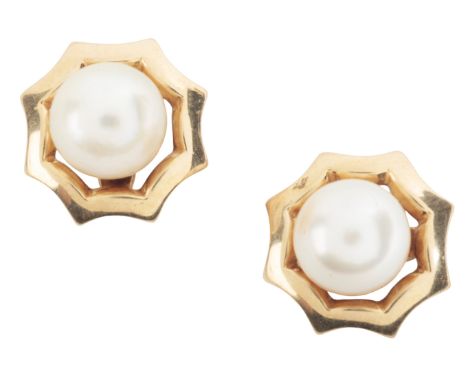 A PAIR OF DAY AND NIGHT PEARL STUD EARRINGSin 18ct gold, each comprising stud set with a cultured pearl of c.7.0mm, surrounde