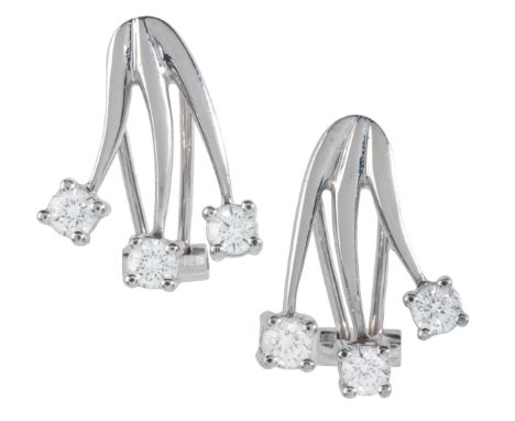 A PAIR OF DIAMOND EARRINGS in 18ct white gold, in a stylised fan design, each set with three round brilliant cut diamonds, al