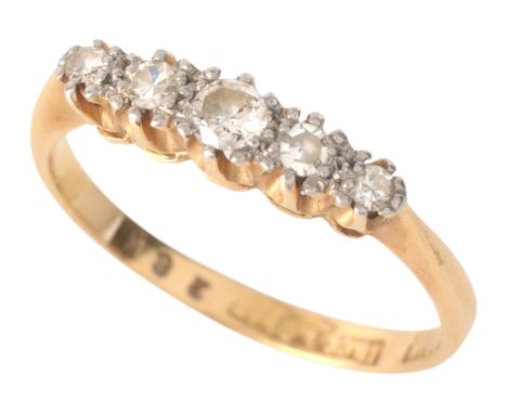 A DIAMOND FIVE STONE RINGin 18ct gold and platinum, set with five round cut diamonds, stamped '18CT&PLAT', size M1/2 / 53, (c