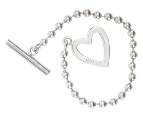 GUCCI: A HEART TOGGLE BRACELETin sterling silver, comprising a row of bead links, secured with an open heart toggle and T-bar