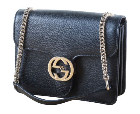 GUCCI: A LADY'S BLACK LEATHER HANDBAGwith beige canvas interior and Gucci leather label, no. 518304, 520081, gilt metal chain