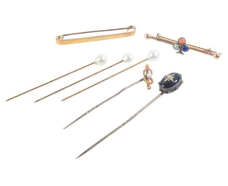 A COLLECTION OF JEWELSincluding a bar brooch in 15ct gold, with club motif set with lapis, coral and pearl cabochons, punctua
