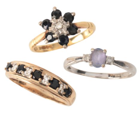 THREE GEM-SET RINGSincluding a sapphire and diamond half eternity ring in 9ct gold; together with a sapphire and diamond clus
