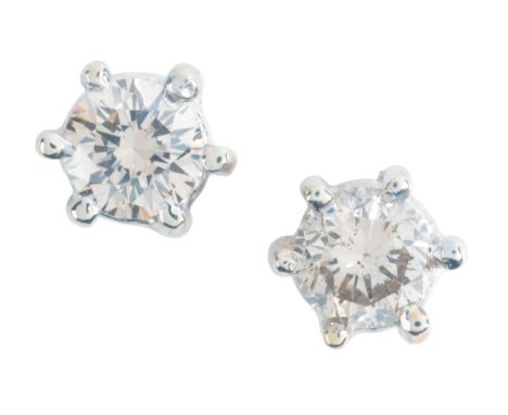 A PAIR OF DIAMOND STUD EARRINGSin 18ct white gold, and platinum, totalling c.1.10 carats, secured with post and butterfly fit