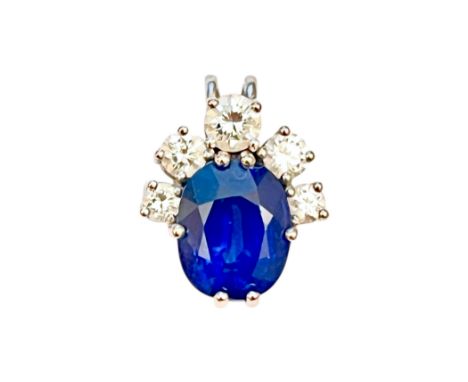 A SAPPHIRE AND DIAMOND PENDANTin 18ct white gold, set with a cushion cut sapphire of c.2.30 carats and five round brilliant c
