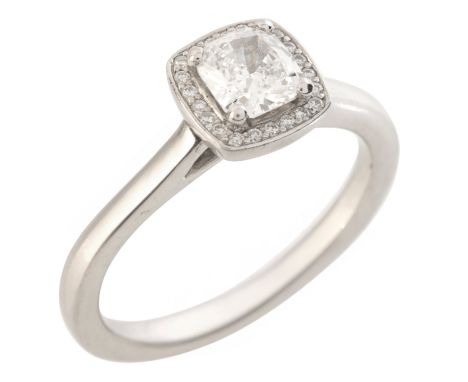 A D COLOUR VS2 CLARITY DIAMOND ENGAGEMENT RINGin platinum, set with a cushion cut diamond of 0.58 carats, surrounded by a hal