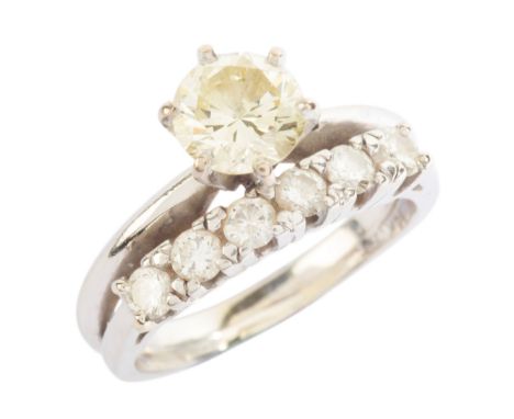 A DIAMOND SOLITAIRE RINGin 14ct white gold, set with a round brilliant cut diamond of c.1.00 carats, stamped '14K', size N / 