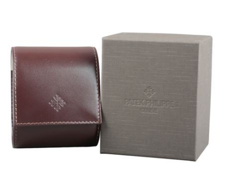 PATEK PHILIPPE: A BROWN LEATHER SINGLE WATCH POUCH in the original box (unused)