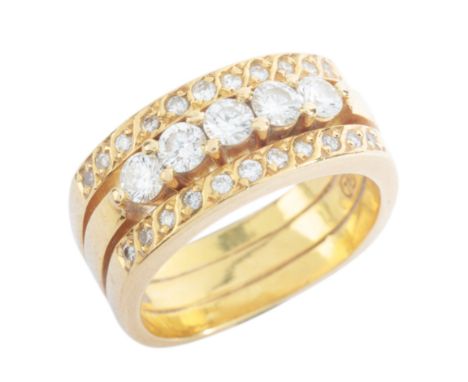 A DIAMOND DRESS RINGin 18ct gold, comprising three cushion-shaped bands, set with five round brilliant cut diamonds to the ce