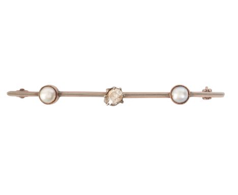 A PEARL AND DIAMOND BAR BROOCHin 9ct gold and platinum, set with an old mine cut diamond, flanked by two split pearls, secure