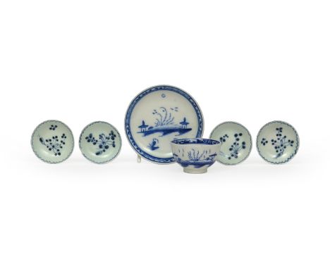 Four miniature Pennington's (Liverpool) blue and white saucers, c.1770, painted with simple stylized flower sprays within a w