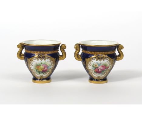 A pair of Royal Worcester vases, date codes for 1905, of small ovoid shape with twin handles, painted by Harry Chair with sma