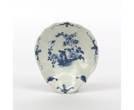 A large Worcester blue and white shell pickle dish, c.1758, the scallop shell form painted with the Two Peony Rock Bird patte