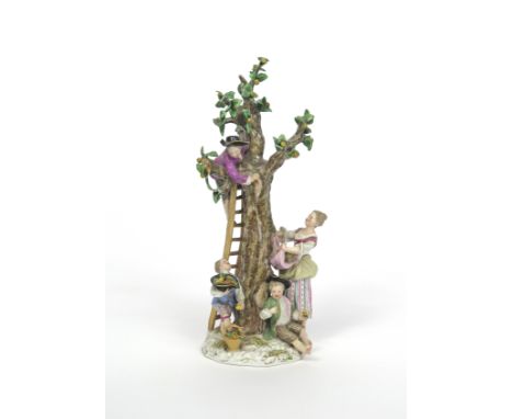 A Meissen figure group of Apple Pickers, 19th century, after the model by Kändler and Meyer, a young boy barefoot up a ladder
