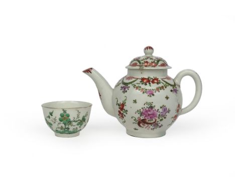 A Lowestoft teapot and cover, c.1770, the globular body painted in polychrome enamels with formal rose sprays and other flora