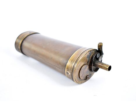 A vintage French brass and copper powder flask, the unmarked flash of oval cylindrical form, 15cm in length 