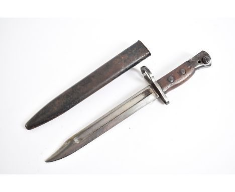 A Jungle Carbine No.5 MkI bayonet by Radcliffe, complete with metal scabbard 